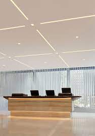 Add Ultramodern Ambiance To An Office Lobby Or Reception Area Led Lighting For Commercial Sp Office Ceiling Design False Ceiling Design Ceiling Design Modern