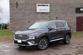 (the smaller santa fe sport seats five and is reviewed separately.). Review The 2021 Hyundai Santa Fe Hybrid Offers A Conventional Suv Drive With Improved Fuel Economy The Globe And Mail