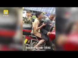 Old lady lost in the city. 12 Year Old Boy In China Stripped Naked Dragged Through The Streets Behind Father S Motorbike For Stealing 20 East Asia News Top Stories The Straits Times