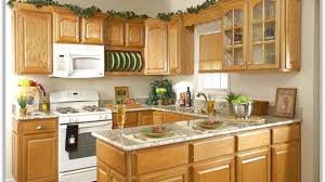 A simple design is applied to the storage models. Decoration Pictures Of Kitchens With Oak Cabinets Wish New Great Ideas To Update Kitchen In 3 Kitchen Remodel Countertops Kitchen Remodel Cost Kitchen Remodel