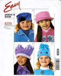 Mccall S 4209 Children S Hat In Four Designs And Two Sizes 21 Inch And 22 Inch Sewing Pattern F Sewing Patterns For Kids Mccalls Sewing Patterns Childrens Hats