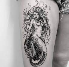A wonderful and strange animal is imagined in the back. Black Mermaid Tattoo Mt Tattoo Gallery