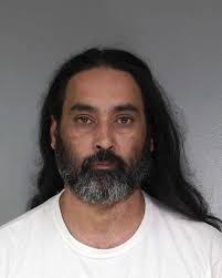 Man Arrested for Allegedly Stabbing a Tire and Threatening Another Man With  Both a Knife and a Crossbow