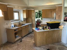 Farm sink (don't recommend depending on your applications, in hindsight i would have opted for something else) pantry cabinets for newly built pantry room during garage remodel. Kitchen Cabinet Painting In Woodbury Okeefe Painting House Painters In Minneapolis Mn