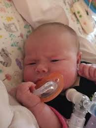 This girl and her eyebrow looks! This is her daddy's face exactly when  being woken up!