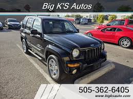 Image result for Brilliant Black 2003 Jeep
