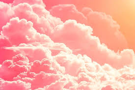 Blue background with a product podium surrounded by pink clouds. Why Are Some Clouds Pink Nayturr