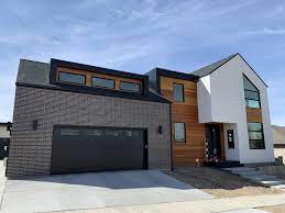 New brickwork was added and the whole house was then painted black to hide the junctions between new and old. White And Black Brick Hearth And Home Distributors Of Utah Llc