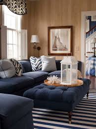 Traditional Nautical Living Room Plan With Elegant Blue Ottoman And Stripped Rug Coastal Decorating Living Room Blue Living Room Traditional Family Rooms