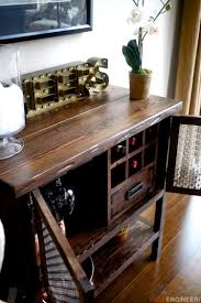Versatile liquor cabinet sitting atop four caster wheels for mobility. Bar Cabinet Rogue Engineer