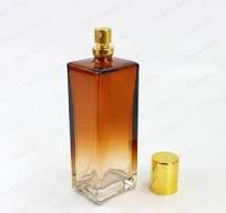 Botella de perfume de vidrio con bomba en degradado marrón