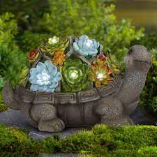 All categories amazon devices amazon fashion amazon global store arts, crafts & sewing automotive parts & accessories baby beauty & personal care books electronics gift cards grocery & gourmet this item: Amazon Com Gigalumi Turtle Garden Figurines Outdoor Decor Garden Art Outdoor For Fall Winter Garden Decor Outdoor Solar Statue With 7 Leds For Patio Lawn Yard Art Decoration Housewarming Garden Gift Kitchen