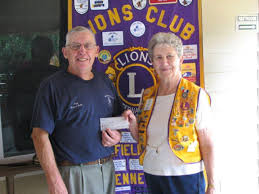 Fairfield Glade Lions honor volunteer fireman and induct five new members