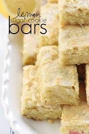 Lemon Sugar Cookie Bars Flavored With Lemon Zest And Topped With Crunchy Sparkling Sugar For A Su Sugar Cookies Recipe Lemon Cookies Easy Lemon Sugar Cookies
