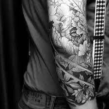 Flower tattoo by jack marsh. Japanese Flower Tattoo Black And Grey Novocom Top