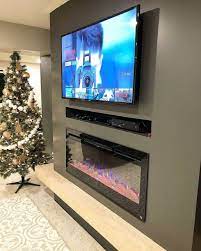 Belleze 47 tv stand entertainment center for tv's up to 50 w/infrared electric fireplace and remote control, ashland pine 4.5 out of 5 stars 801 $269.99 $ 269. 33 Stunning Modern Fireplace Design Ideas With Tv Above Modern Fireplaces Not Just About Heati Living Room Decor Fireplace Fireplace Remodel Modern Fireplace
