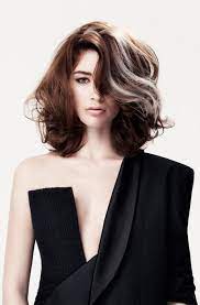Interesting Haircolor Technique Women Actually Adding Streaks Of Gray To Their Hair Very Dramatic B White Streak In Hair Hair Streaks Gray Hair Growing Out