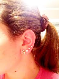quadruple ear lobe piercing with tiffany first earring my work in progress ear piercings earings piercings unique ear piercings