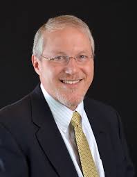 By day, Dan Berry is the CEO of Duke Credit Union, but now he can also be  identified by a different title