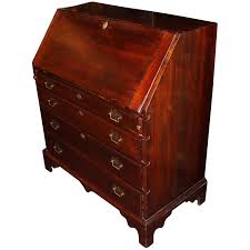 In the movie, the hero, benjamin franklin gates (played by nicholas cage) has to break into the white house to find clues hidden in a secret compartment in the resolute desk in the oval office. 18th C Chippendale Mahogany Slant Front Desk With Secret Compartments New Hampshire Antique Co Op Ruby Lane