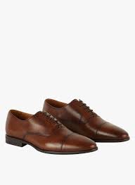 Oxford shoes for men are characterized by a closed lacing system. Oxford Schuhe Aus Leder Cognac Minelli Herren Place Des Tendances