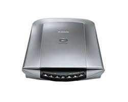 You should try downloading the windows 7 version of the software and drivers for you scanner from the canon support web site: Canon Canoscan 4400f Treiber Windows Und Mac Download