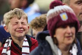 This young Aston Villa fan shedding a tear watching his side take