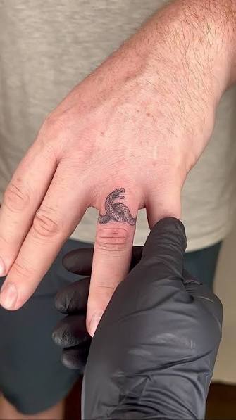Snake Finger Tattoo • 200+ reels on Instagram