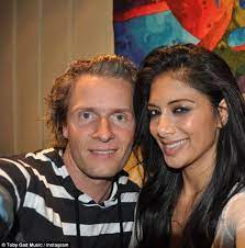 His birth sign is aries and his life path number is 4. 50 000 Worth Of Cash And Gold Coins Stolen From La Mansion Of Toby Gad Daily Mail Online
