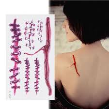 Zombie tattoos are making their presence known in tattoo shops. Accesorios Realista Horror Tatuaje Temporal Maquillaje Halloween Hombre Mujer 3 Grande 6 Pequeno 75 Estilos Horror Cicatrices Heridas Tatuajes Pegatinas Halloween Tatuajes Temporales Halloween Zombie Tattoo Juguetes Y Juegos Brandknewmag Com