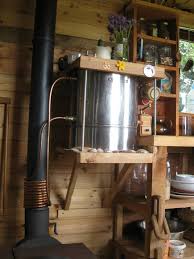 A Tiny House On Wheels In Ireland Wood Stove Water Heater House On Wheels Tiny House On Wheels