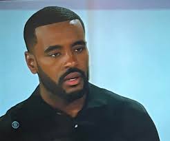 Ashley's boyfriend acts real strange when someone mentions him being a hero  for going back into the fire. I think he's hiding something