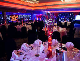 Spend an evening exploring a glamorous masquerade theme with a bold black and gold color scheme and dynamic. Masquerade Theme Party
