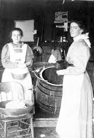Two Women In A Kitchen Churning Butter Ca 1898 Dunbar History Project Caley Meegan History Old Photos Hard Working Women
