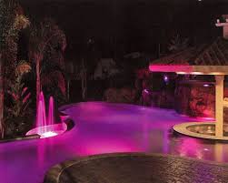 A Pool With Colored Lights Custom Pools Pool Light Led Pool Lighting