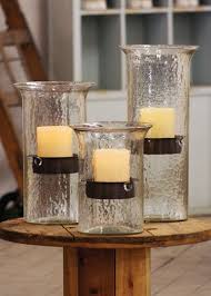 Aluminum surround at each end of the hurricane lamp candle holder. Glass Candle Hurricanes With Rustic Insert 65 90 Cylinder Candles Hurricane Candles Glass Hurricane Candle Holder