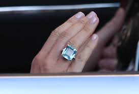 Meghan Markle Wears Princess Diana S Ring And Stella Mccartney Dress As Prince Harry Drives Newlyweds To Reception In Jaguar Diana Ring Princess Diana Ring How To Wear Rings