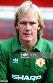 Who are the players in this old South African football team photo?