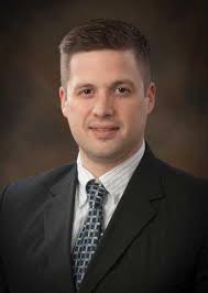 Aaron Emerson graduates from Bank Compliance School