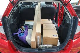60/40 split seats fold completely flat 0:45 haul mode Is The Honda Fit S Magic Seat Really Magic News Cars Com