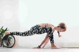 7 Ways To Use A Yoga Wheel