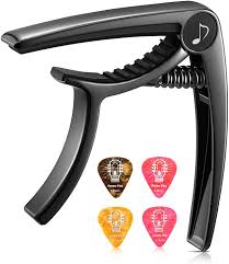 Check spelling or type a new query. Amazon Com Donner Guitar Capo For Electric And Acoustic Guitar Dc 2 Ukulele Capo Black With 4 Picks Musical Instruments