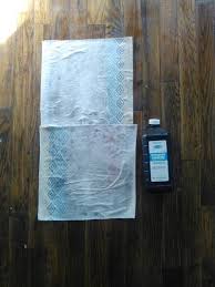 Pour Hydrogen Peroxide On Urine Stain Set Paper Towel Over It To Soak Up Solution Notice Refinishing Hardwood Floors Refinishing Floors Hardwood Floor Repair