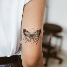 Butterfly on flower butterflies love flowers of all sizes. 24 Pretty Butterfly Tattoos Ideas To Get In 2020 Tiny Tattoo Inc