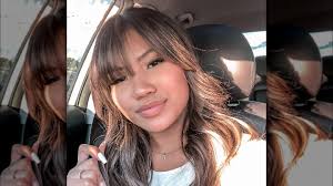 Curve Bangs' Are The Dramatic Hair Trend That Takes Curtain Fringe To The  Next Level