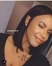 Leave the remaining hair open and loose. Aaliyah Beautiful And Beauty Image Aaliyah Hair Hair Beauty Hair Styles