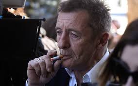 DRUMMER PHIL RUDD SAYS “ME AND EVERYONE ELSE SAYS THAT [I AM STILL A MEMBER  OF AC/DC], BUT THAT'S NOT WHAT ANGUS [YOUNG] SAYS”