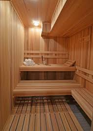 Beautiful Two Toned Wood Interior Of A Traditional Sauna With Multilevel Bench Placement Spa Rooms Indoor Sauna Sauna Design