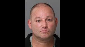 Man charged with impersonating police officer