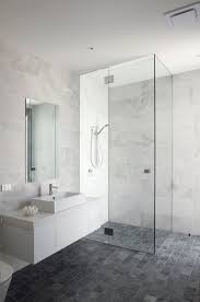 The walls are painted green, covered with decorative ceramic tiles with white. Get In The Mood With Fifty Shades Of Grey White Marble Bathrooms Grey Floor Tiles Grey Bathroom Tiles
